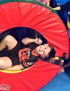 Happy boy in gymnastics donut